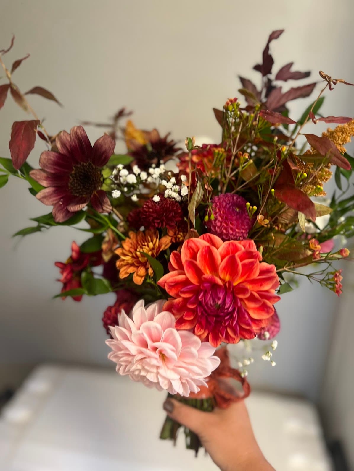 Uploaded bouquet with pink and burgundy cut flowers